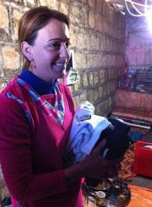 Displaced family living in parking lot